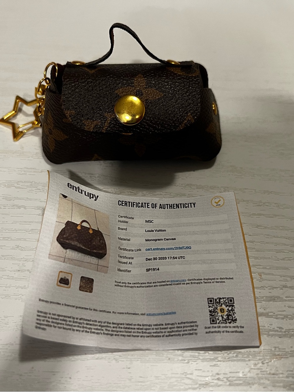 Mini purse made with Louis Vuitton material